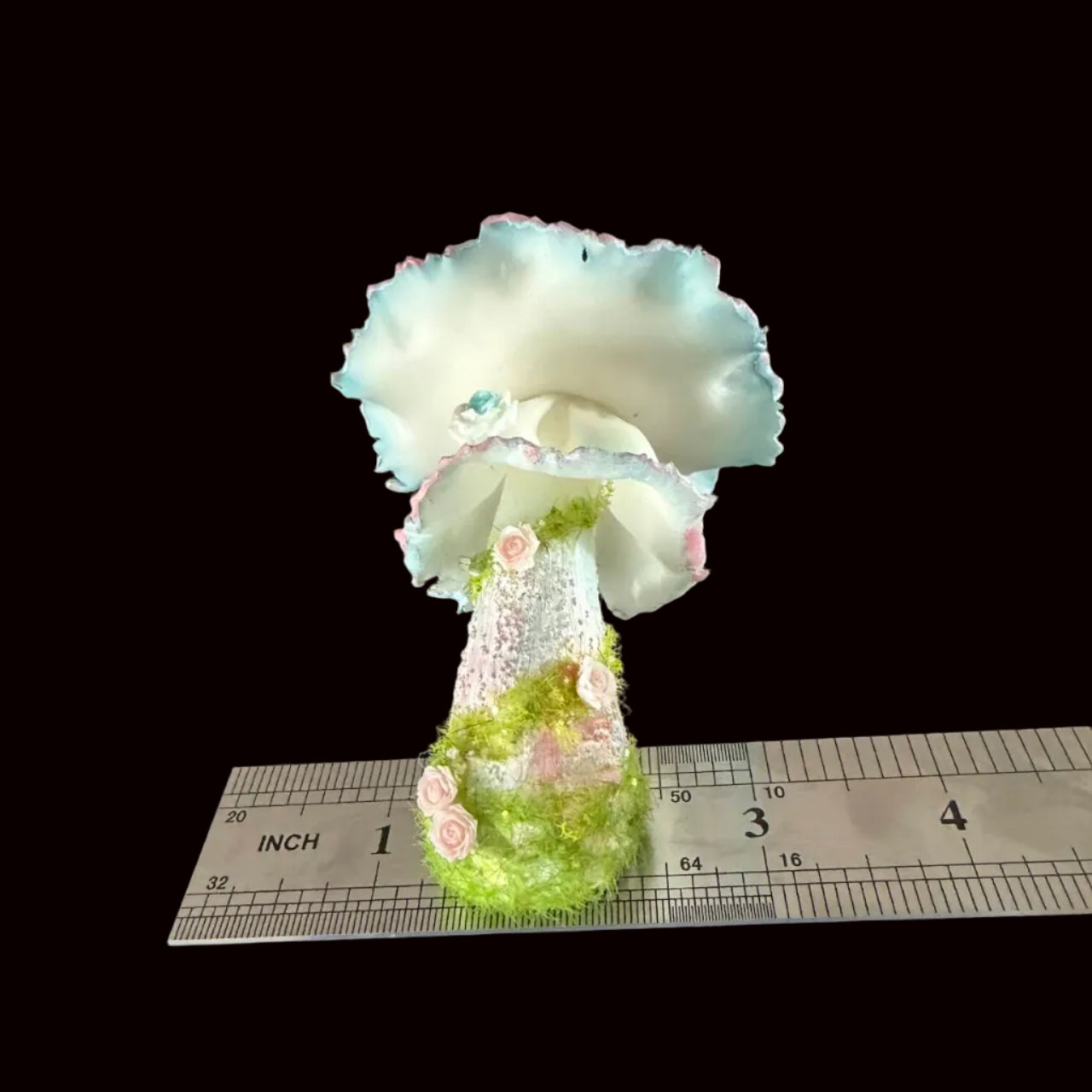 Handmade bloom veil fairy mushroom resin clay magnet full height view with ruffled blue pink cap rose stem and moss base, ruler showing approx 4 inches – Sylva Garden