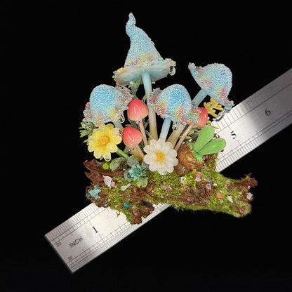 Handmade blue glitter mushroom cluster resin clay magnet with floral accents on log base, angled view with size reference ruler – Sylva Garden