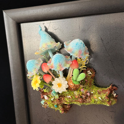 Handmade blue glitter mushroom cluster resin clay magnet with floral log base attached to metal refrigerator door, lifestyle view – Sylva Garden