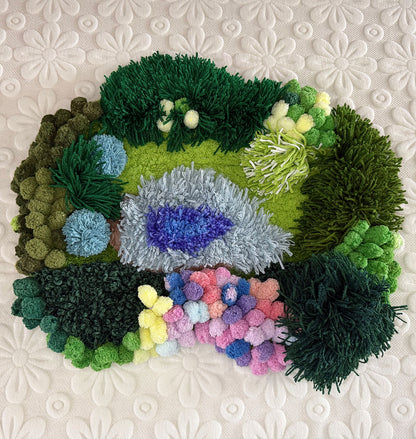Fern Hollow crochet moss mat — top view, full botanical pattern