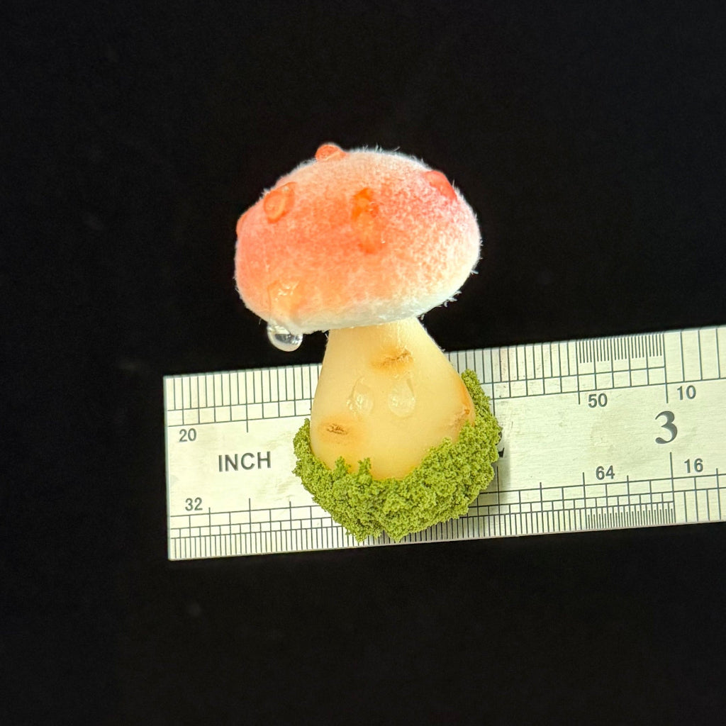 Handmade fluffy russula resin clay fridge magnet in pink with fuzzy cap texture and size reference ruler on black background – Sylva Garden