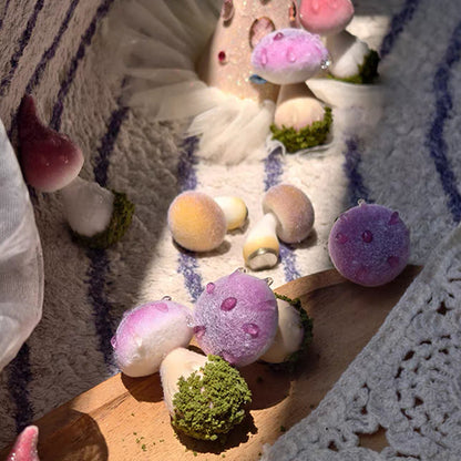Collection of handmade fluffy russula resin clay fridge magnets in multiple colors displayed on lace cloth and wooden board – Sylva Garden