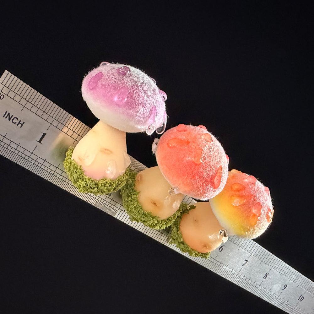  Handmade fluffy russula resin clay fridge magnets in three colors with size reference ruler, overhead view on black background – Sylva Garden