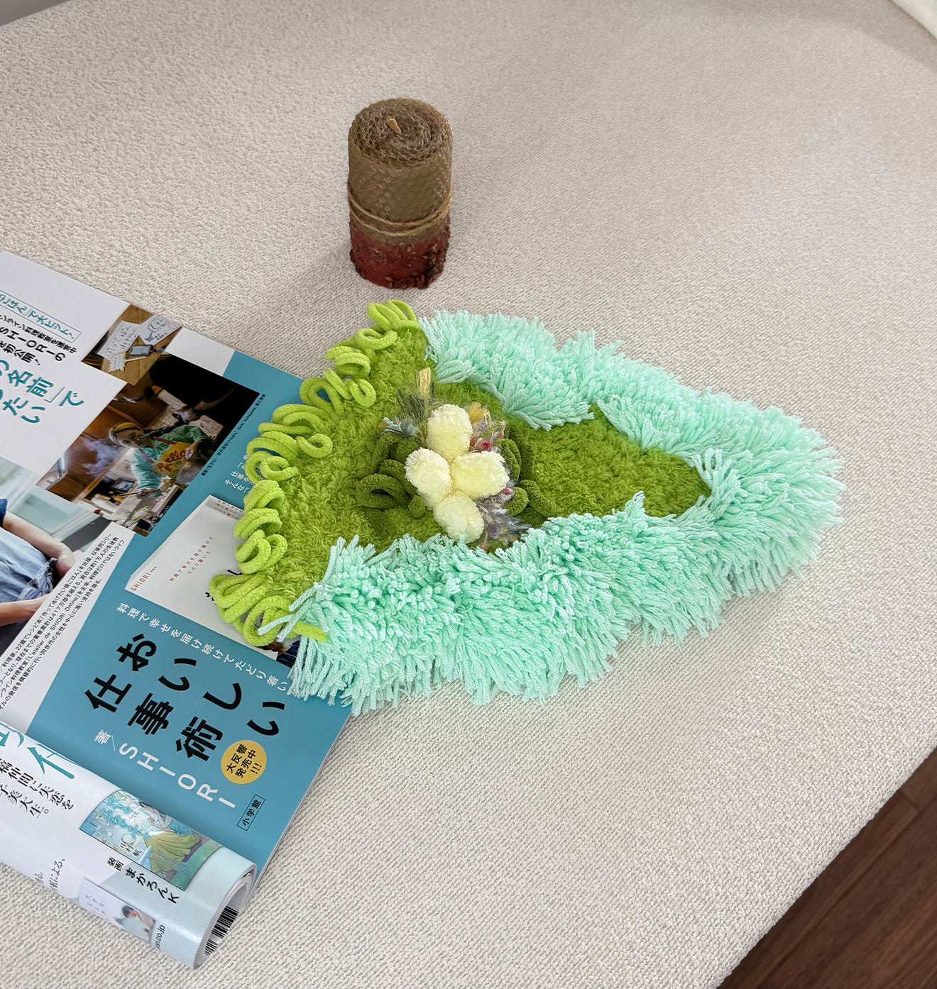 Jade Thicket crochet moss coaster styled with magazine — handmade botanical desk decor by Sylva Garden