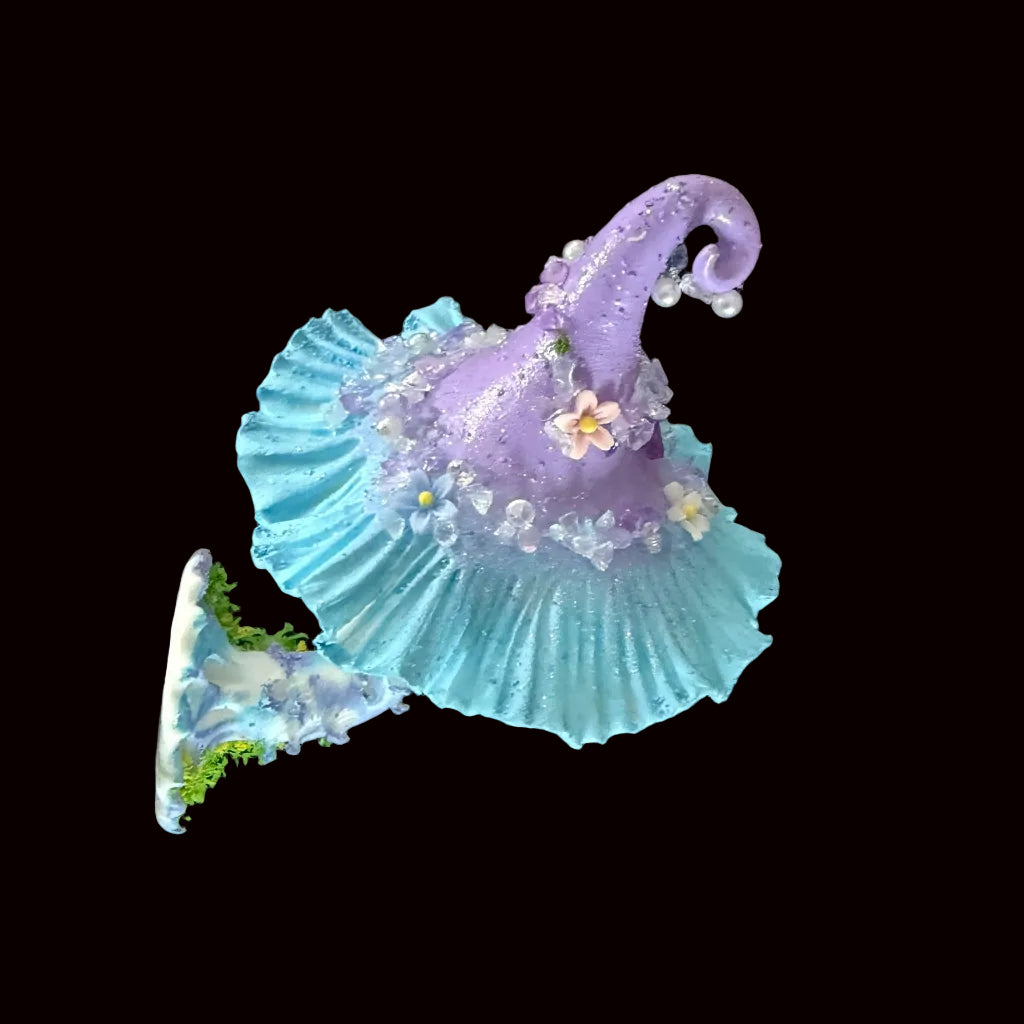 Lavender blue fairy witch hat resin clay fridge magnet with ruffled brim and floral details, angled view – Sylva Garden