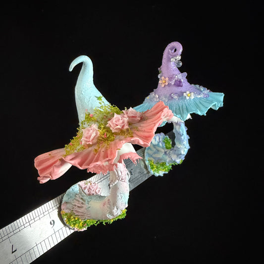 Lavender blue fairy witch hat resin clay fridge magnet with glitter and flower details, front view – Sylva Garden
