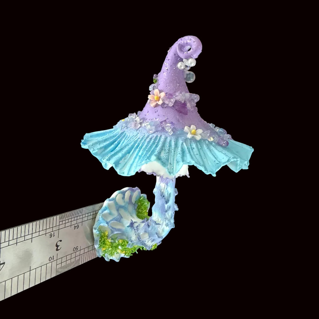 Lavender blue faerie mushroom witch hat resin clay fridge magnet with layered ruffled brim and moss base, full view – Sylva Garden
