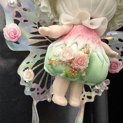  Handmade petal wing butterfly resin clay fridge magnet showing body detail with mint green base pink roses and holographic butterfly wings on black background – Sylva Garden