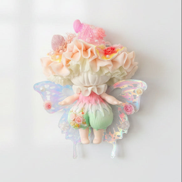 Handmade petal wing butterfly resin clay fridge magnet with holographic wings pink ruffled cap and rose accents, front view on black background – Sylva Garden