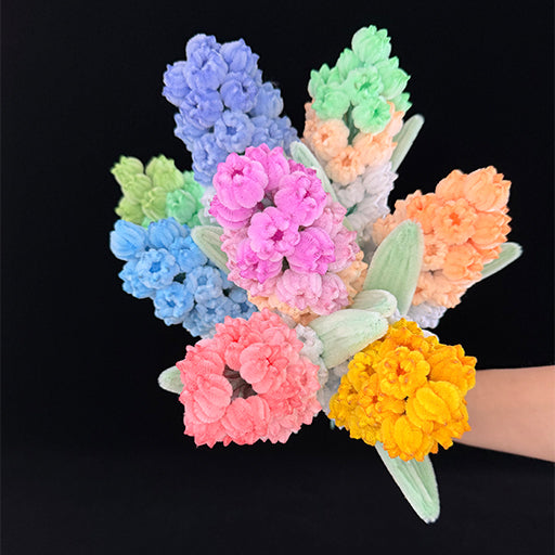 Handmade pipe cleaner grape hyacinth — 8 pastel shades bouquet held in hand, top view