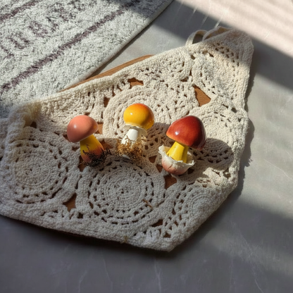 Handmade russula mushroom resin clay fridge magnets styled on bohemian linen cloth with marble background, lifestyle scene – Sylva Garden