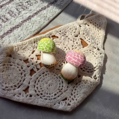 Handmade russula virescens mushroom resin clay fridge magnets in green and pink styled on bohemian linen cloth, lifestyle scene – Sylva Garden