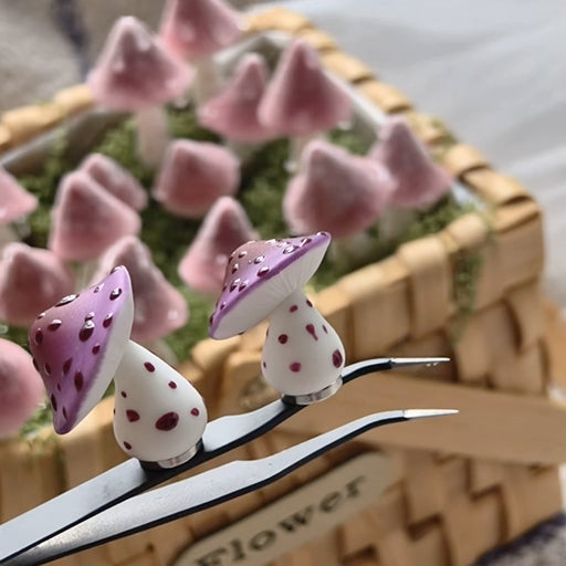 Handmade speckle mushroom resin clay fridge magnets in purple held by tweezers showing size and detail – Sylva Garden