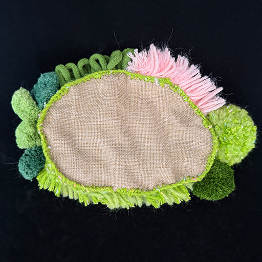 Summer River crochet moss coaster — back view, handmade finish