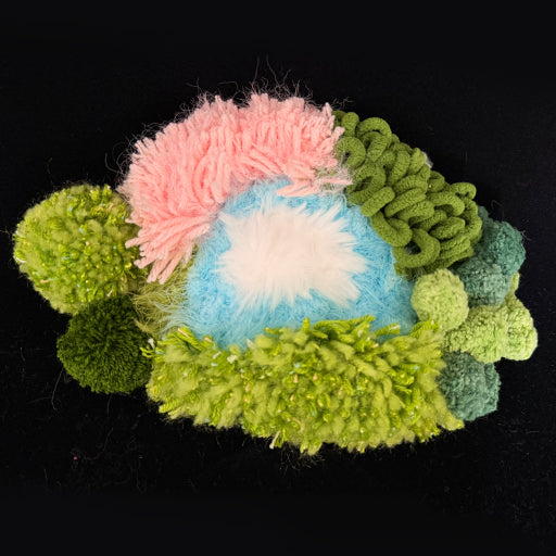 Summer River crochet moss coaster — front view, lush botanical texture